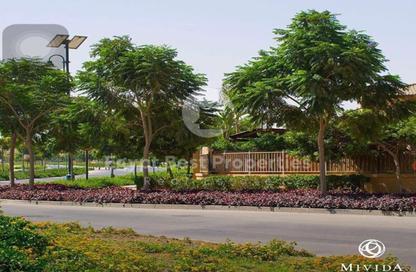 Townhouse - 4 - 4 for sale in Mivida Gardens - Mostakbal City - Future City - Cairo