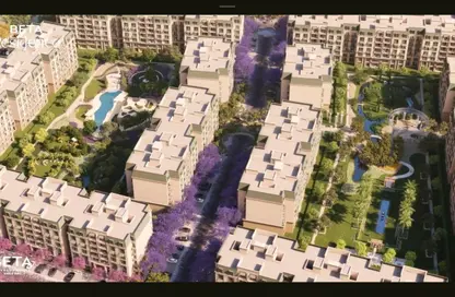 Apartment - 3 Bedrooms - 3 Bathrooms for sale in Aqmar - Al Wahat Road - 6 October City - Giza