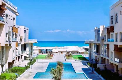 Chalet - 3 Bedrooms - 3 Bathrooms for sale in Direction White - Ras Al Hekma - North Coast Chalet - 3 Bedrooms - 3 Bathrooms for sale in Direction White - Ras Al Hekma - North Coast