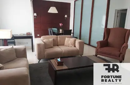 Apartment - 2 Bedrooms - 2 Bathrooms for sale in The Village - South Investors Area - New Cairo City - Cairo