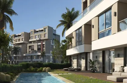 Apartment - 3 Bedrooms - 3 Bathrooms for sale in Aqmar - Al Wahat Road - 6 October City - Giza