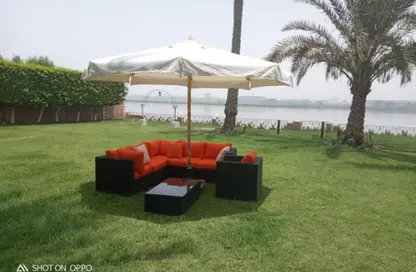 Villa - 6 Bathrooms for sale in Nile Corniche St. - Al Agouza - Giza