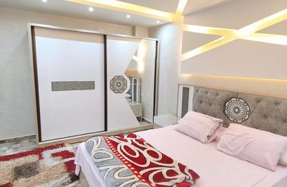 Apartment - 2 Bedrooms - 1 Bathroom for rent in Moez Al Dawla St. - 6th Zone - Nasr City - Cairo