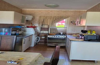 Chalet - 3 Bedrooms - 2 Bathrooms for sale in Bungalows - Markaz Al Hamam - North Coast