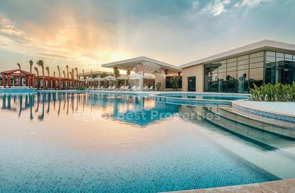 Villa - 4 Bedrooms - 5 Bathrooms for sale in Beit Al Bahr - Sidi Heneish - North Coast