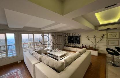 Apartment - 2 Bedrooms - 3 Bathrooms for rent in Ahmed Heshmat St. - Zamalek - Cairo