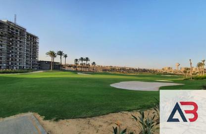 Apartment - 3 - 4 for sale in The Fourteen Golf Residences - Uptown Cairo - Mokattam - Cairo