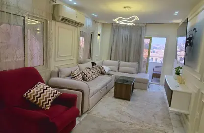 شقة - 2 غرف نوم - 2 حمامات للايجار في شارع الثوره - الدقي - الجيزة