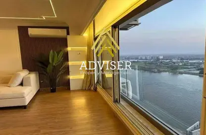 Hotel Apartment - 1 Bedroom - 1 Bathroom for sale in Reve Du Nil - Athar El Nabi - Hay Masr El Kadima - Cairo