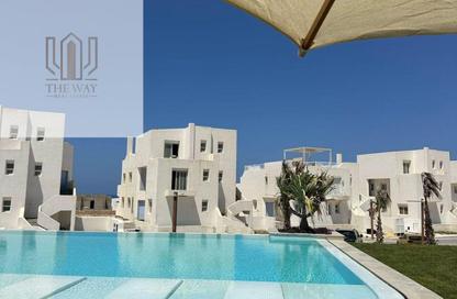 Chalet - 2 Bedrooms - 2 Bathrooms for sale in Hacienda Waters - Qesm Ad Dabaah - North Coast