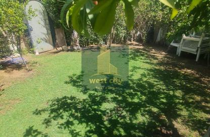 Villa - 3 Bedrooms - 4 Bathrooms for sale in Mena Garden City - Al Motamayez District - 6 October City - Giza