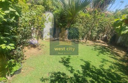 Villa - 3 Bedrooms - 4 Bathrooms for sale in Mena Garden City - Al Motamayez District - 6 October City - Giza