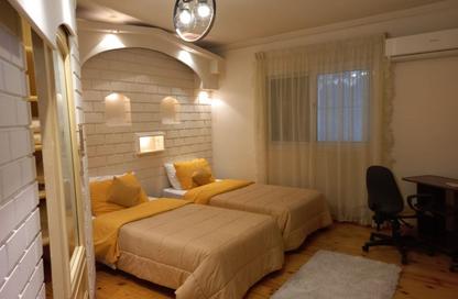Apartment - 2 Bedrooms - 2 Bathrooms for rent in Al Ahrar St. - Dokki - Giza
