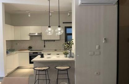 Apartment - 3 Bedrooms - 3 Bathrooms for sale in Porto October - Green Belt - 6 October City - Giza