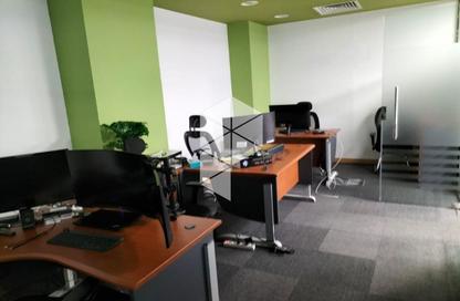 Office Space - Studio - 2 Bathrooms for rent in Cairo Festival City - North Investors Area - New Cairo City - Cairo