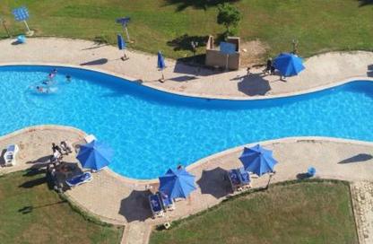 Chalet - 2 Bedrooms - 2 Bathrooms for sale in Golf Porto Marina - Al Alamein - North Coast