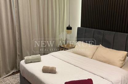 Apartment - 2 Bedrooms - 2 Bathrooms for sale in Palm Hills Village Gate - South Investors Area - New Cairo City - Cairo