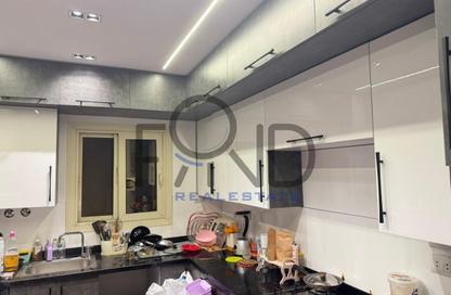 Apartment - 2 Bedrooms - 3 Bathrooms for sale in Mohammed Farid Axis - District 4 - The 5th Settlement - New Cairo City - Cairo