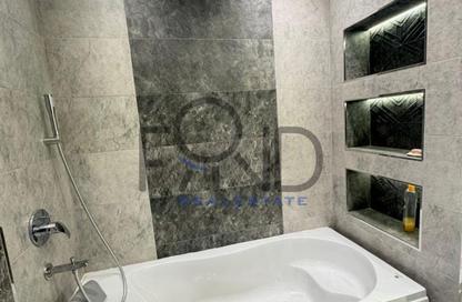 Apartment - 2 Bedrooms - 3 Bathrooms for sale in Mohammed Farid Axis - District 4 - The 5th Settlement - New Cairo City - Cairo