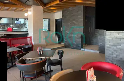 Restaurant - Studio - 2 Bathrooms for rent in Arkan Plaza - 26th of July Corridor - Sheikh Zayed City - Giza