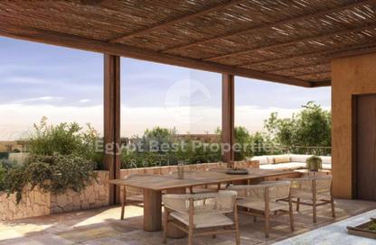 Chalet - 2 Bedrooms - 2 Bathrooms for sale in Ramla Lakeside - Qesm Ad Dabaah - North Coast