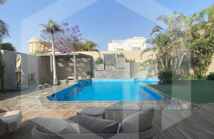 Villa - 5 Bedrooms - 4 Bathrooms for sale in Mena Garden City - Al Motamayez District - 6 October City - Giza