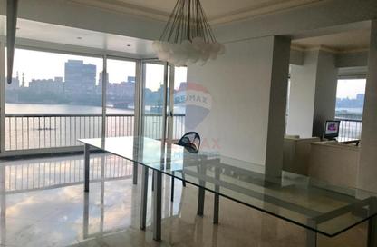 Apartment - 3 Bedrooms - 3 Bathrooms for rent in Nile St. - Dokki - Giza