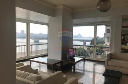 Apartment - 3 Bedrooms - 3 Bathrooms for rent in Nile St. - Dokki - Giza