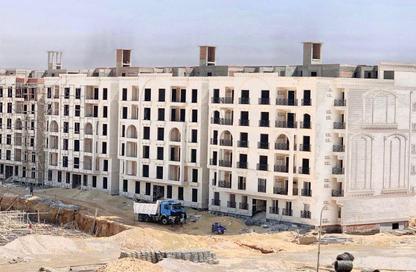 Apartment - 3 Bedrooms - 3 Bathrooms for sale in Garden Gate - Ashgar City - Al Wahat Road - 6 October City - Giza