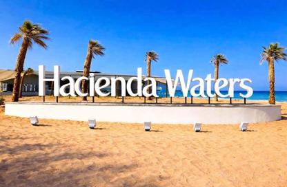 Chalet - 2 Bedrooms - 3 Bathrooms for sale in Hacienda Waters - Qesm Ad Dabaah - North Coast