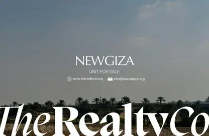 Villa - 4 Bedrooms - 5 Bathrooms for sale in New Giza - Cairo Alexandria Desert Road - 6 October City - Giza