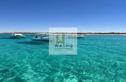 Chalet - 2 Bedrooms - 2 Bathrooms for sale in Beit Al Bahr - Sidi Heneish - North Coast