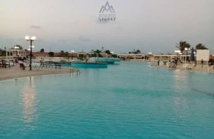 Villa - 4 Bedrooms - 3 Bathrooms for sale in Gamaet Al Dewal El Arabeya Village - Markaz Al Hamam - North Coast