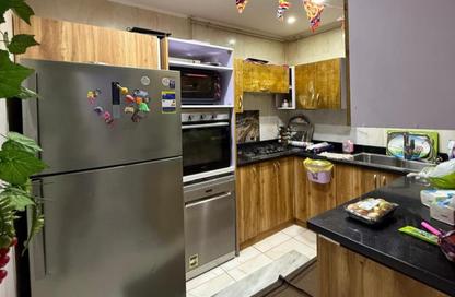 Duplex - 4 Bedrooms - 2 Bathrooms for sale in Quraish St. - 6th Zone - Nasr City - Cairo