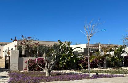 Villa - 4 Bedrooms - 3 Bathrooms for sale in Beit Al Bahr - Sidi Heneish - North Coast