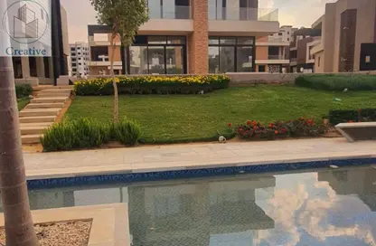 Twin House - 4 Bedrooms - 3 Bathrooms for sale in Midtown - New Capital Compounds - New Capital City - Cairo
