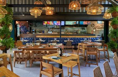 محل - استوديو - 2 حمامات للبيع في اركان بلازا - محور 26 يوليو - الشيخ زايد - الجيزة